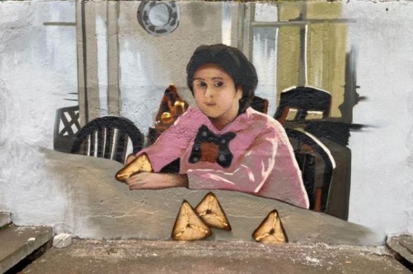 Девочка с эчпочмаками. Казанцы обсуждают новое граффити